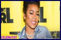 Keyshia Cole sends retro vibes in colorful, skimpy two-piece with a big afro wig in new photos